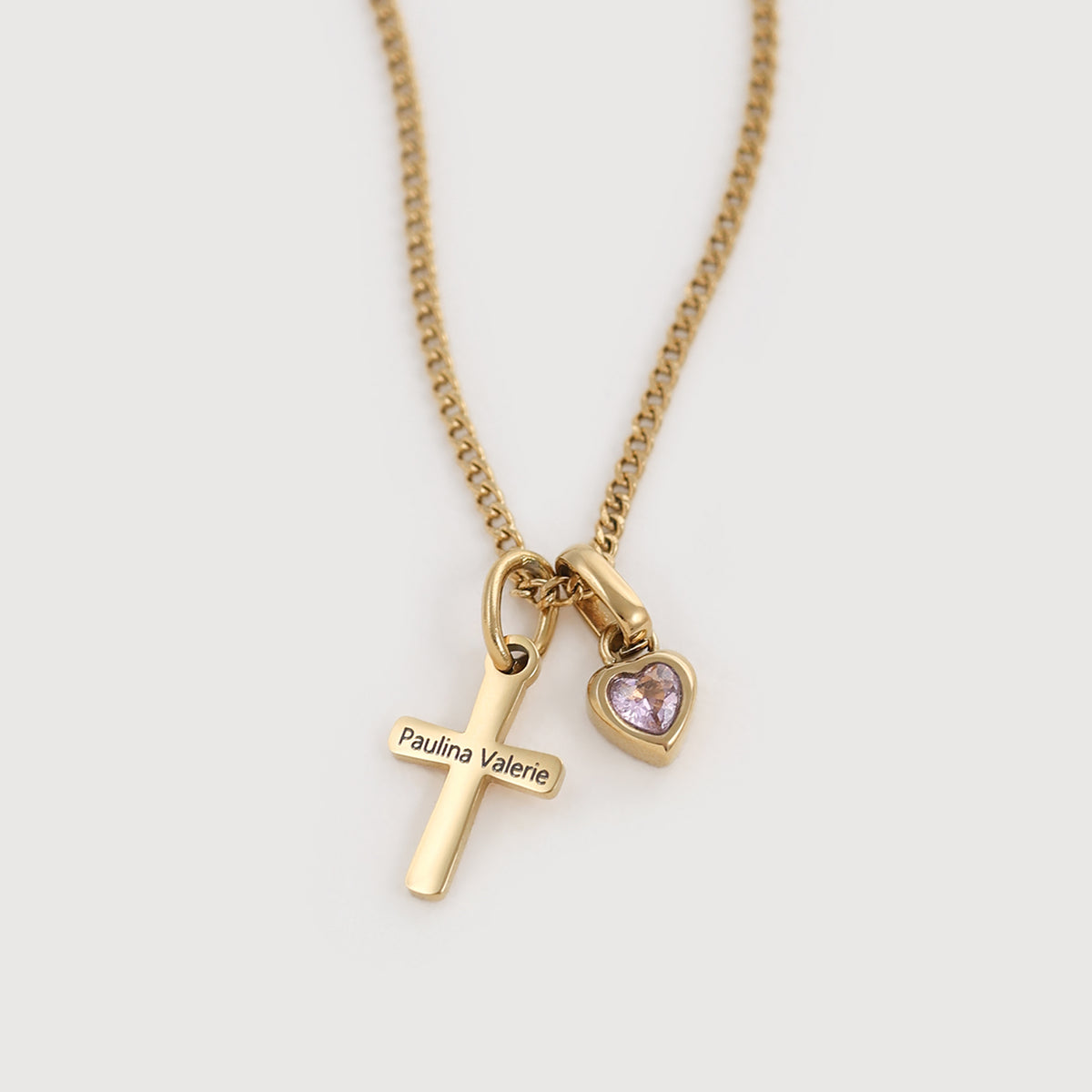Goldene Kreuzkette mit Gravur 'Paulina Valerie' und rosafarbenem Geburtsstein in Herzform