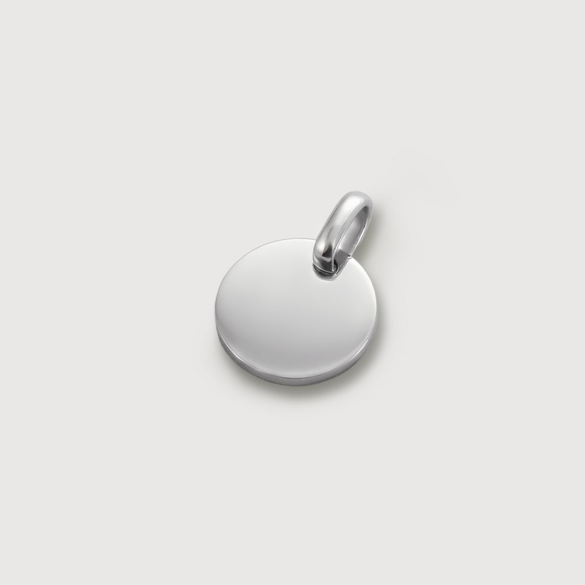 Zusatz-Gravurplättchen 10mm rund in Silber – glänzende Oberfläche mit Öse