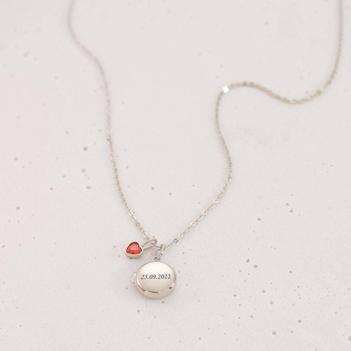 Mini Medaillon Kette mit Herz-Geburtsstein in Silber, graviert mit Datum 25.09.2022