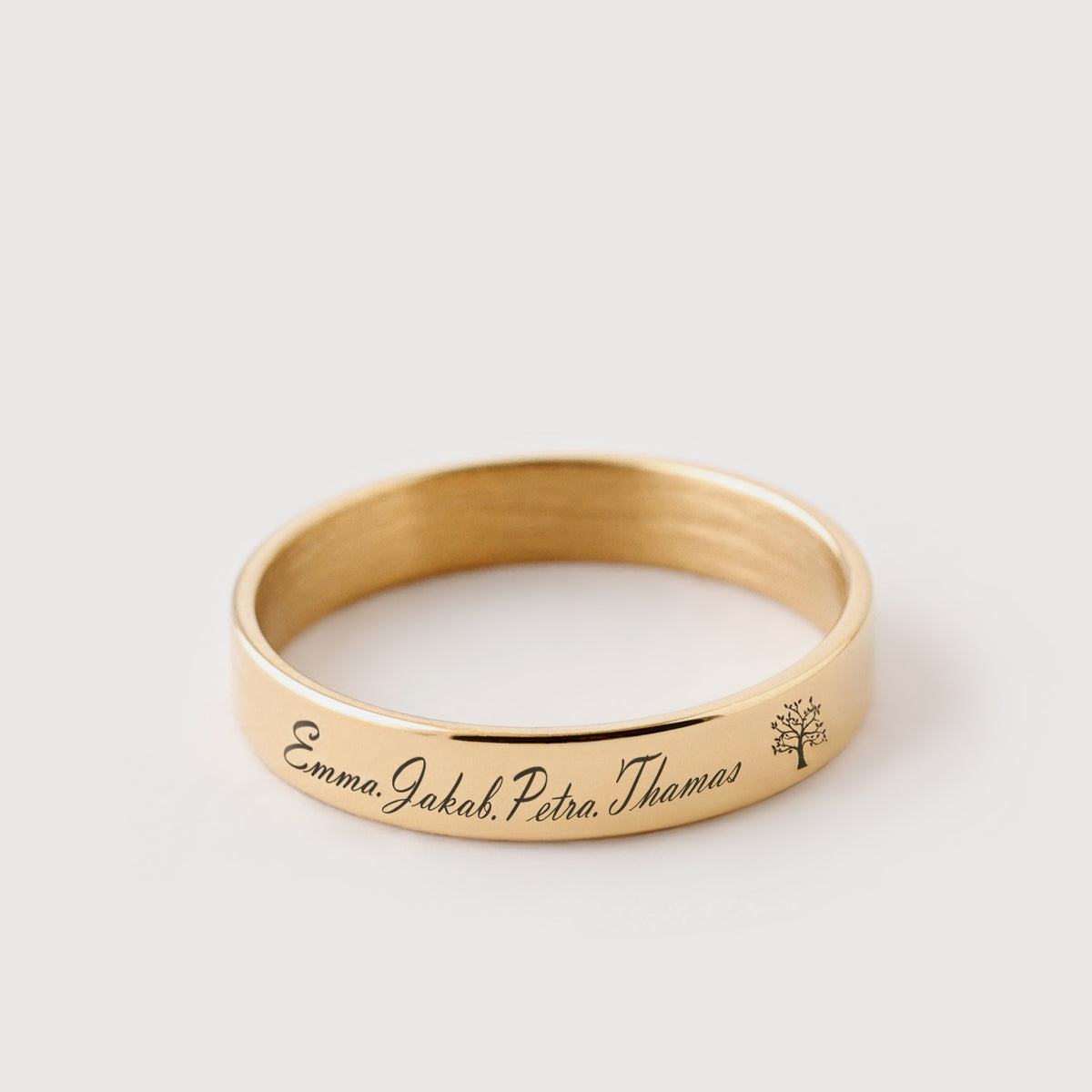 Herren Stapelring mit Gravur in Gold, graviert mit Familiennamen und Baum-Symbol