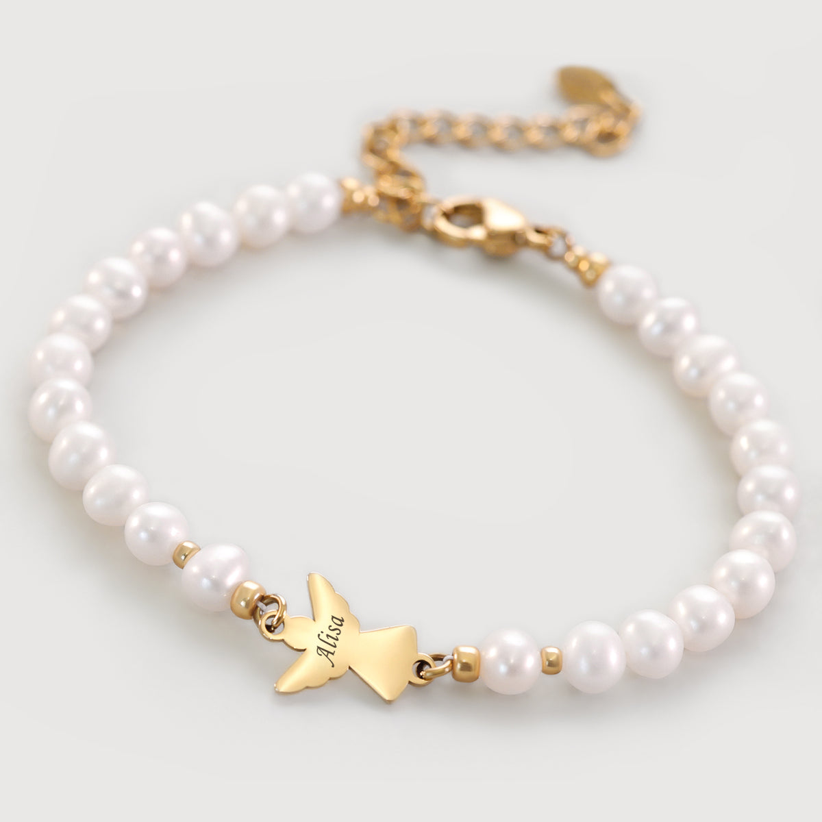 Perlenarmband mit Süßwasserperlen und goldenem Engel-Anhänger, Verschluss mit Verlängerungskette