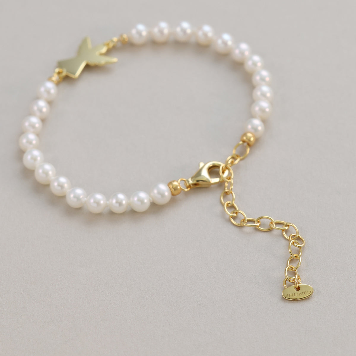 Perlenarmband mit goldenem Engel, Karabiner und Verlängerungskette mit Herz-Plättchen