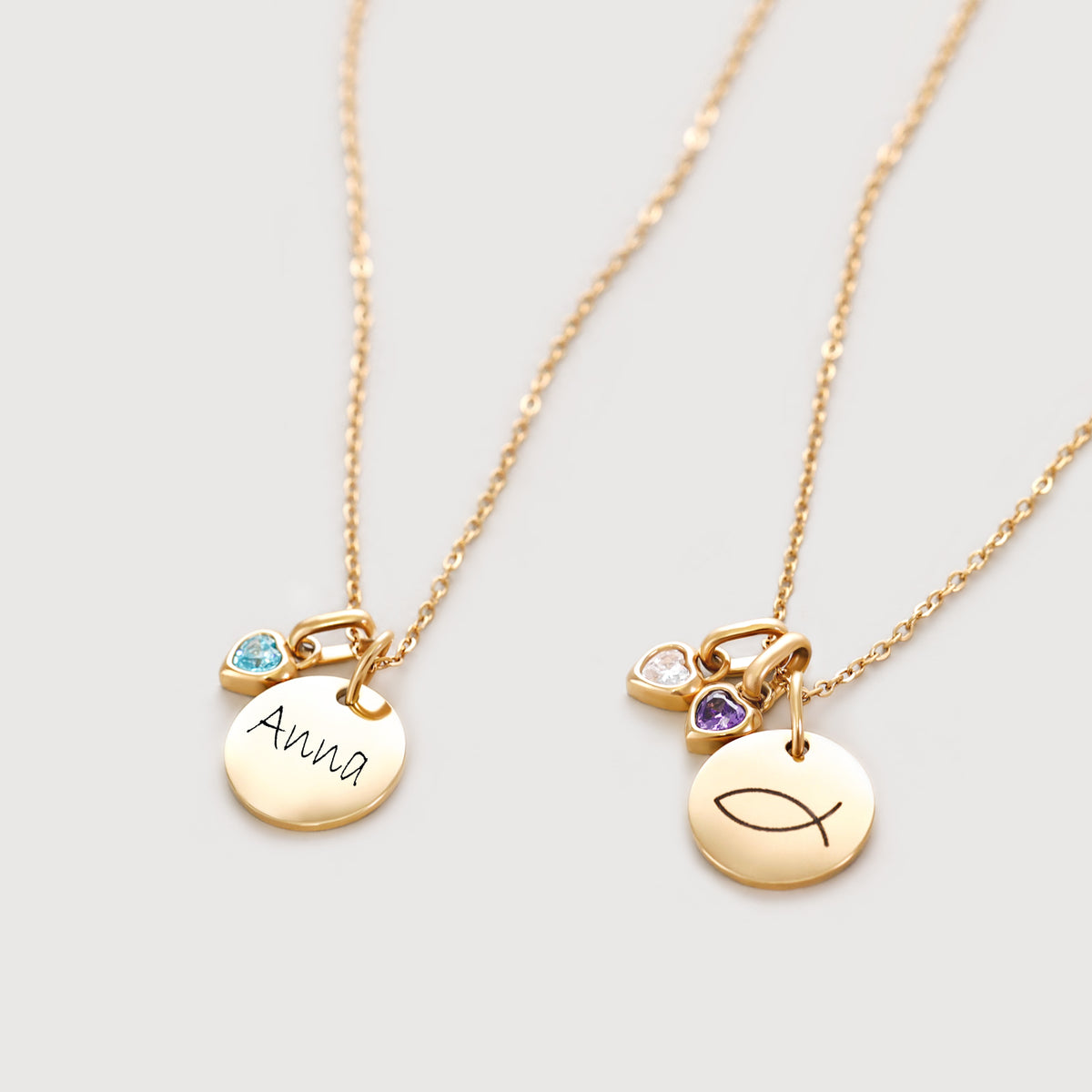Personalisierte Namenskette mit Zirkonia Geburtsstein in Gold, zwei Varianten mit Name und Fisch-Symbol