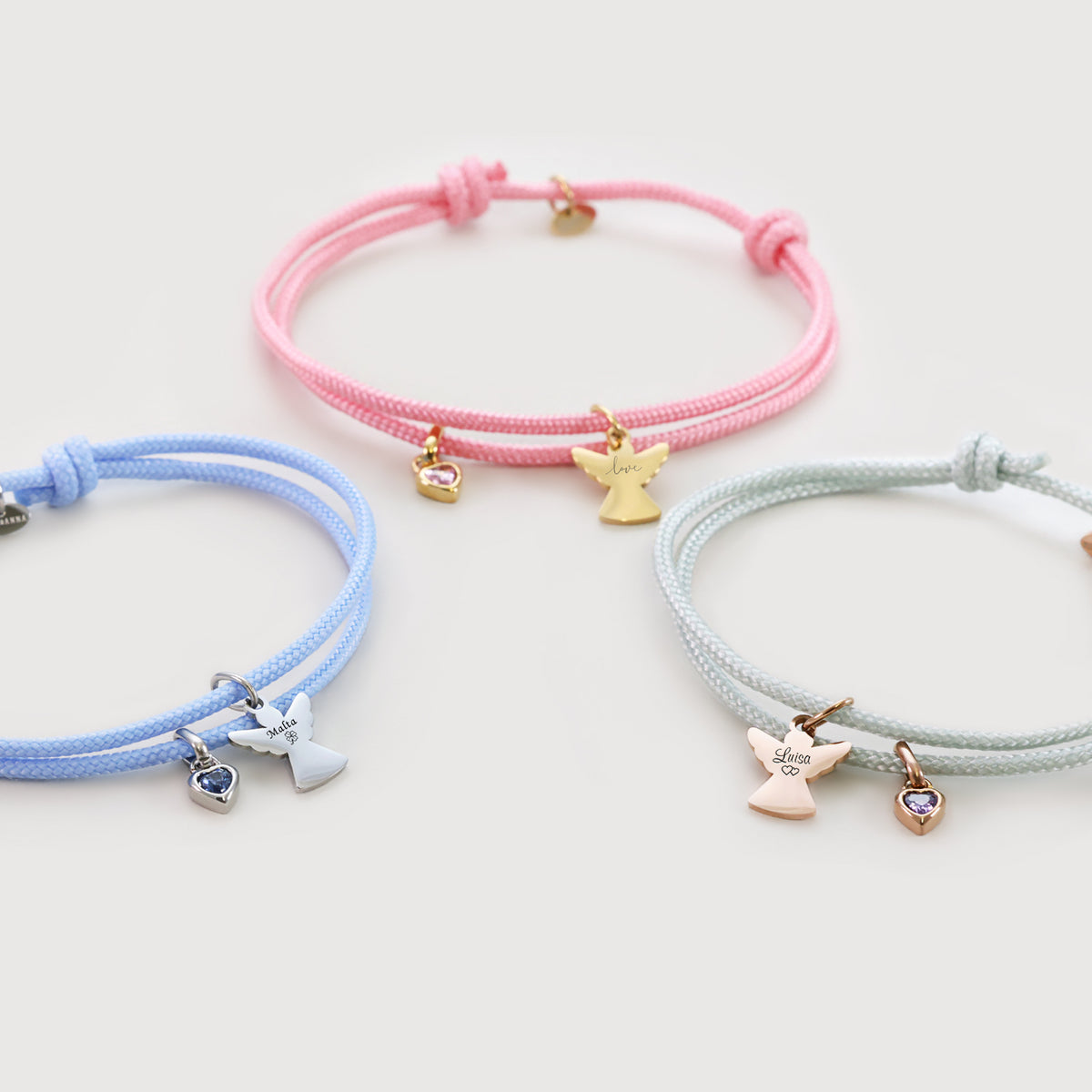 Segeltau Armbänder mit Schutzengel und Geburtsstein in Hellblau, Rosa und Mint im Vergleich