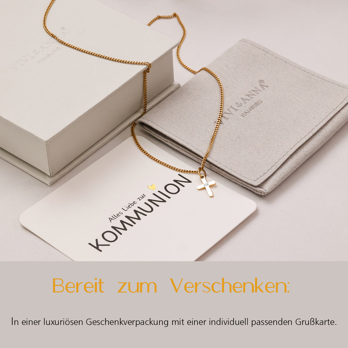 Mini Kreuz-Kette in Gold in Geschenkverpackung mit Samtbeutel und Kommunionkarte