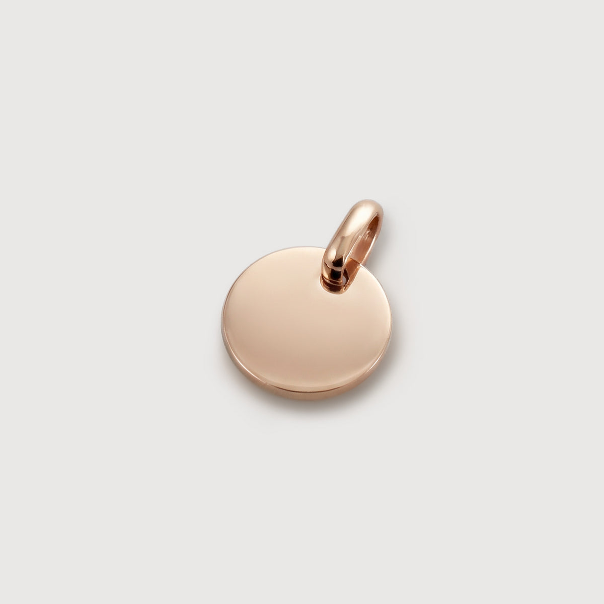 Zusatz-Gravurplättchen 10mm rund in Roségold – glänzende Oberfläche mit Öse