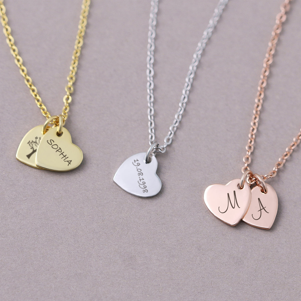 Herzkette mit Gravur – drei Varianten in Gold, Silber und Roségold mit Namen und Datum graviert
